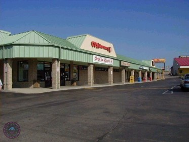 Commercial strip center w restaurant and pharmacy