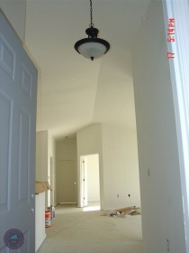 Entry to loft with cathedral ceiling